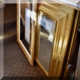 D05. Gold framed mirror 38” x 30”